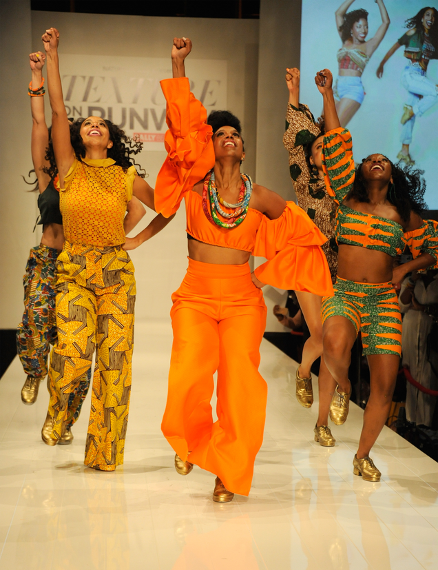 Dancers perform on the runway for Cantu during “Texture on the Runway,” presented by NaturallyCurly, on Sept. 7, 2017, in New York City. (Rabbani and Solimene Photography/Getty Images for NaturallyCurly)